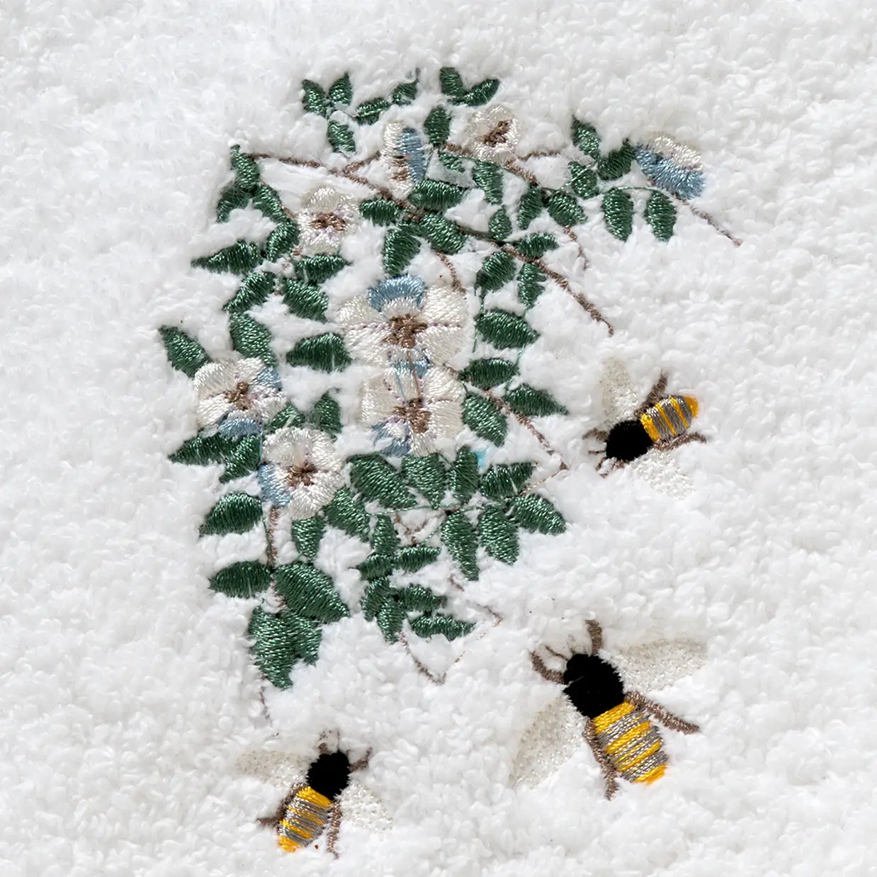 Serviette d'invité en éponge brodée Abeille